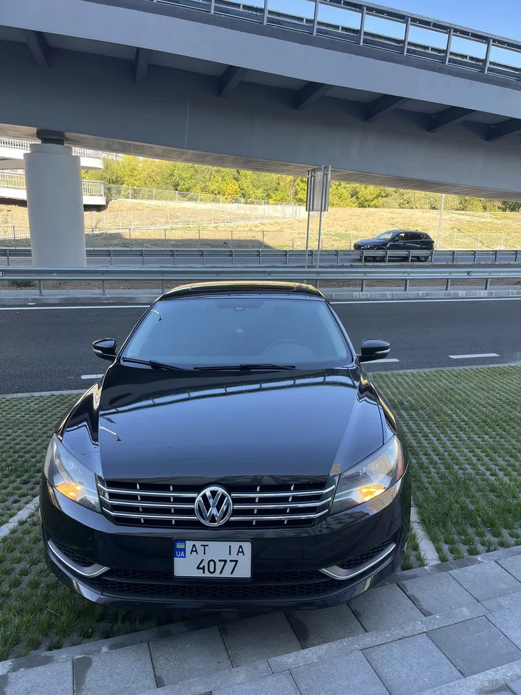 Фото 2014 Volkswagen Passat Sedan