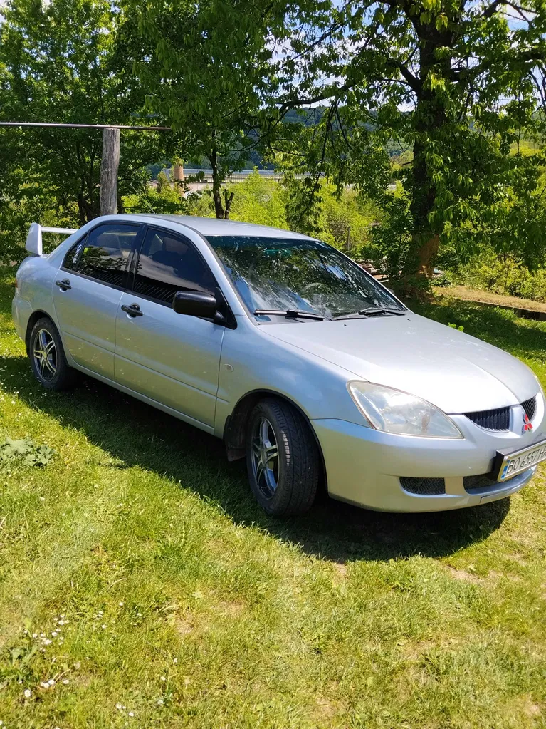 Фото 2004 Mitsubishi Lancer